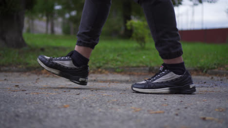 Close-up-Of-A-Persons-Feet-While-Walking-Continuously-Towards-A-Certain-Direction-In-Kysucké-Nové-Mesto,-Slovakia