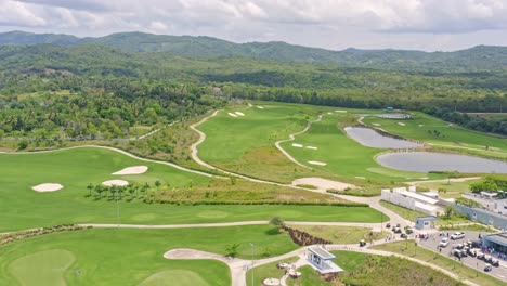 Drone-flying-over-Vistas-Golf-and-Country-Club,-Santo-Domingo-in-Dominican-Republic