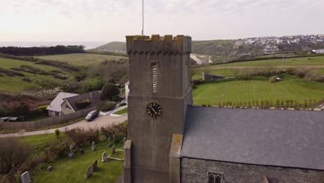 Aerial-Crantock-Village-Church-revealing-Crantock-Beach-in-Cornwall