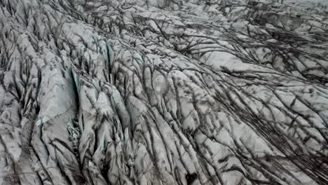 Glacier-in-Iceland-with-drone-video-close-up-moving-from-above