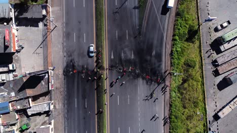 Angry-indigenous-people-protesting-with-blocking-the-panamerican-highway-in-Ecuador