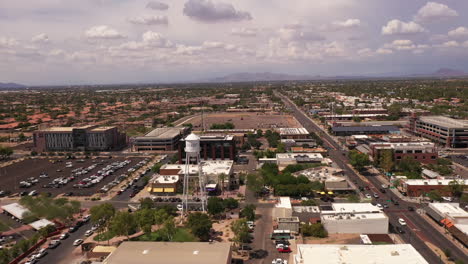 Drone-flyby-local-water-tower-and-landmark-in-Gilbert,-Arizona