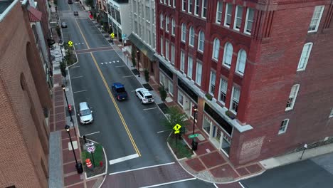 Aerial-above-downtown-street-scene-with-historic-buildings-in-Lynchburg-Virginia