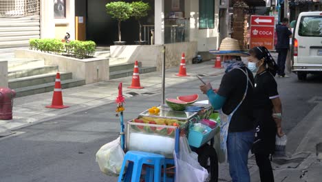 Man-selling-fruits-,-street-fruit-stall-,-streets-of-Bang