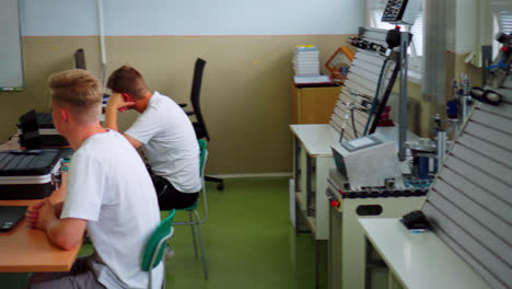 Students-Listening-To-Their-Teacher-During-Class-Discussion-In-A-Vocational-School-In-Slovakia---panning