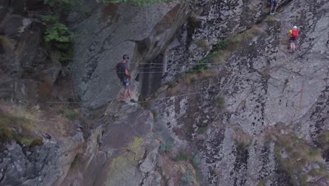 Drone-flying-toward-climbers-on-Via-Ferrata-del-Gorbeillon