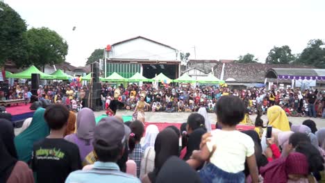 Traditional-dance-performance-at-the-opening-ceremony-of-the-Creative-Economy-Village-in-Gegesik-Village,-Cirebon,-West-Java-in---Indonesia