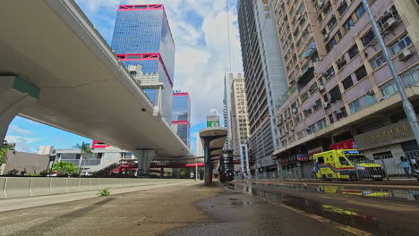 Timelapse-of-Western-Market-Tram-Stop-and-Shun-Tak-centre,-Hong-Kong