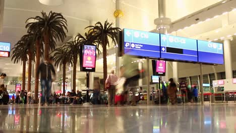 A-short-time-lapse-of-people-moving-at-Dubai-International-Airport