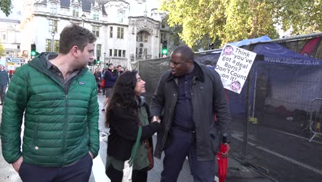 David-Lammy-leaves-the-stage-at-the-People's-Vote-protests-in-London,-UK