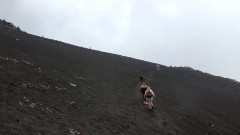 People-Trekking-Towards-Crater-of-Mount-Etna