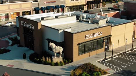 Aerial-descending-push-in-shot-of-PF-Chang's-Chinese-Restaurant-location