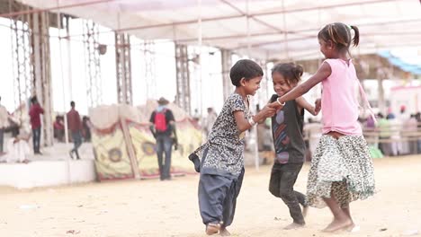 Poor-Indian-homeless-children-playing-with-their-friends-outdoor,-poverty-and-innocence,-SLOW-MOTION-Full-HD