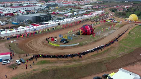 Inflating-a-hot-air-balloon-on-an-ATV-race-track