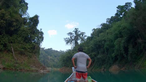Traveling-by-boat-through-river-in-Khao-Sok-national-park-in-Thailand