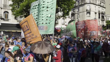 A-big-amount-of-protesters-walking-along-the-street-in-Buenos-Aires