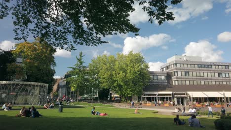 Elisenbrunnen-park-with-people-and-archaeological-showcase-in-the-german-city-of-Aachen