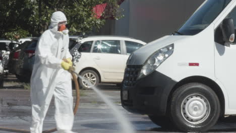 Brazilian-Military-team-cleanses-a-road-outside-of-a-hospital