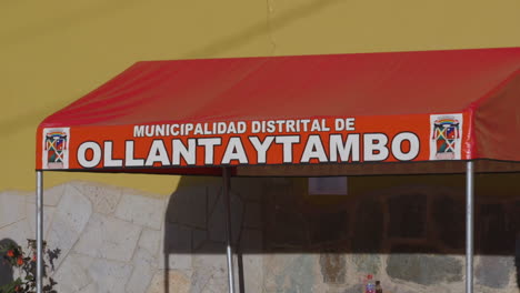 The-municipality-of-Ollantaytambo's-outdoor-gazebo-tent-in-the-Plaza-De-Armas,-the-town's-main-square