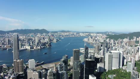 Horizonte-De-Hong-Kong-Con-Rascacielos-Y-Vistas-A-La-Bahía-En-Un-Hermoso-Día-Claro,-Vista-Aérea