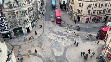 This-high-angle-view-of-the-intersection-between-High-Street-and-Cornmarket-in-Oxford-is-taken-from-the-top-of-Carfax-Tower