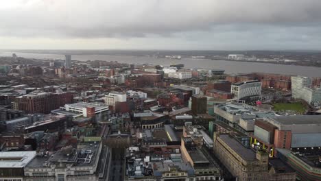 Aerial-view-across-iconic-Liverpool-city-waterfront-skyline-empty-streets-during-corona-virus-pandemic