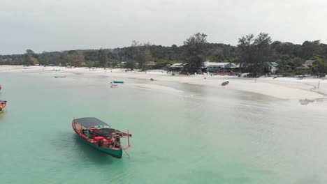 Fly-over-boats-at-tropical-waters-and-approach-beach-bar,Koh-Rong-Samloem