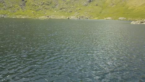 Lake-at-the-top-of-a-mountain-in-the-Lake-District