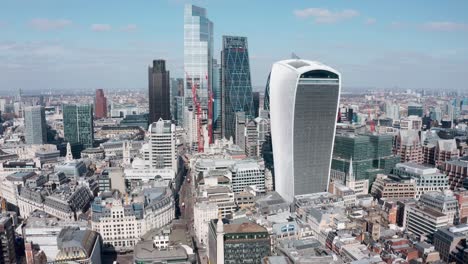 London-Aerial-drone-shot-into-skyscraper-cluster-to-Gherkin-building