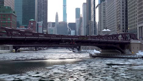 Downtown-City-Frozen-River-With-Ice