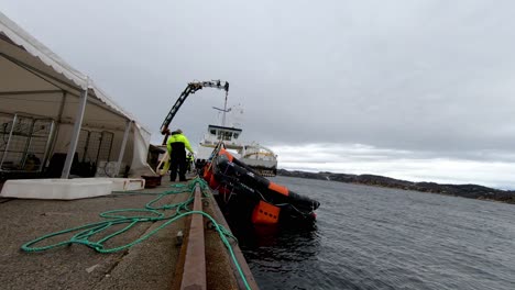 Timelapse-of-Viking-Life-service-personnel-retrieving-liferaft-back-onshore-after-live-testing-drill-onboard-passenger-vessel