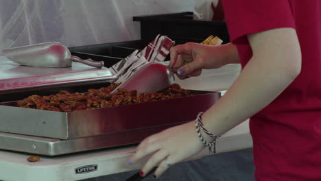 Pecan-nuts-being-prepared-during-Dogwood-Festival,-Siloam-Springs,-Arkansas