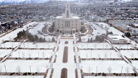 Aerial-Reveal-Payson-Mormon-Temple-And-Snow-Capped-Mountains