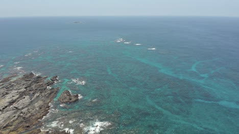 Aerial-view-of-Tropical-Reef-and-Tide-Pools-on-Yakushima-Island,-Japan
