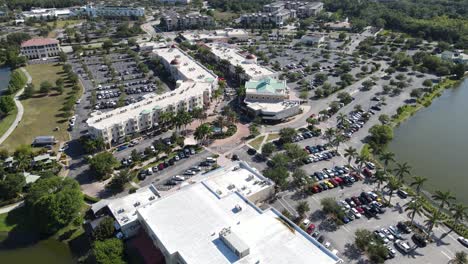 slow-aerial-of-Lakewood-Ranch-Mainstreet-shopping-and-restaurant-area,-Bradenton,-Florida