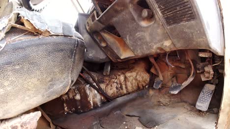 old-rustic-abandoned-car-interior-at-junk-yard