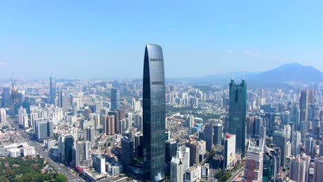 Shenzhen-skyline-including-Kingkey-Finance-Tower-KK100,-the-second-tallest-skyscraper-in-Shenzhen,-Aerial-view