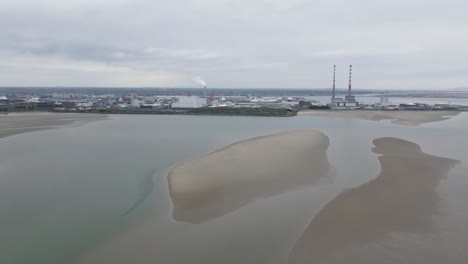 Pale-Sandymount-strand-shores-distant-from-Poolbeg-stacks-aerial