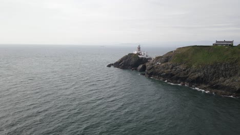 Unearthly-island-Howth-head-Baily-lighthouse-at-peak-aerial