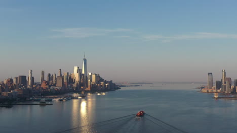An-aerial-view-of-lower-Manhattan-and-New-Jersey-from-over-the-Hudson-River-at-sunrise