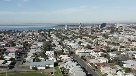 AERIAL-Over-City-Of-Greater-Geelong-and-Corio-Bay,-Victoria-Australia