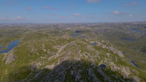 Aerial-View-Of-Lyngsheia-Mountains,-Hiking-Area-On-A-Sunny-Day-At-West-Coast,-Norway
