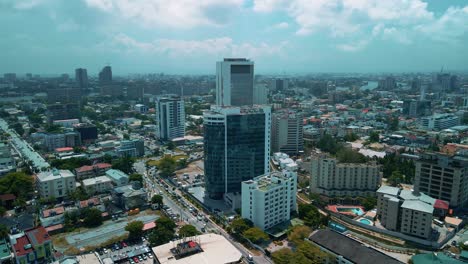 Victoria-Island-Lagos,-Nigeria---24-June-2021:-Drone-view-of-major-roads-and-traffic-in-Victoria-Island-Lagos-showing-the-cityscape,-offices-and-residential-buildings