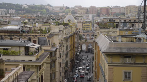 Traffic-in-the-streets-of-Genoa-Italy-during-the-day,-Pan-shot