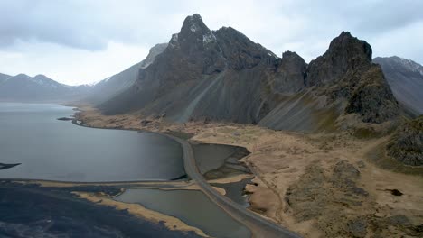 Drone-of-Iceland-Eastern-Fjords-dramatic-dark-coastline