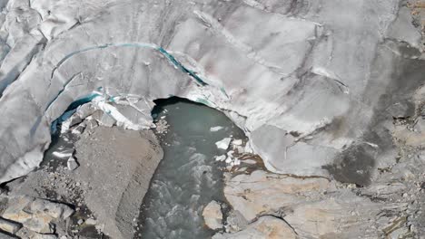 Aerial:-terminus-of-glacier,-end-of-glacier-melting-and-breaking,-global-warming