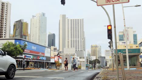 Many-pedestrians-crossing-a-zebra-crossing-on-a-major-avenue-in-the-streets-of-Panama-City