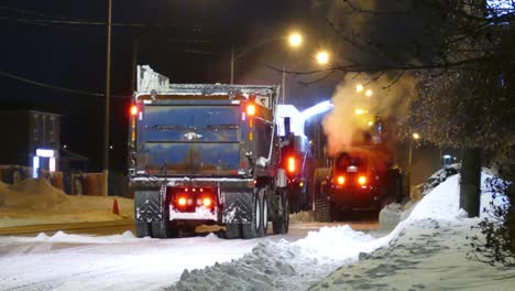 A-snow-removal-operation-on-the-road-at-night