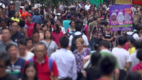 Slow-motion-footage-of-crowded-busy-Main-Street-in-the-metropolitan-asiatic-city-Chinese-society-concept