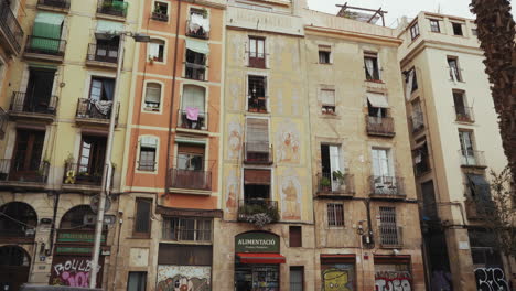 Barcelona---Plaza-De-Jaume-Zabartés-Murales-On-Ancient-Facades-Of-Buildings